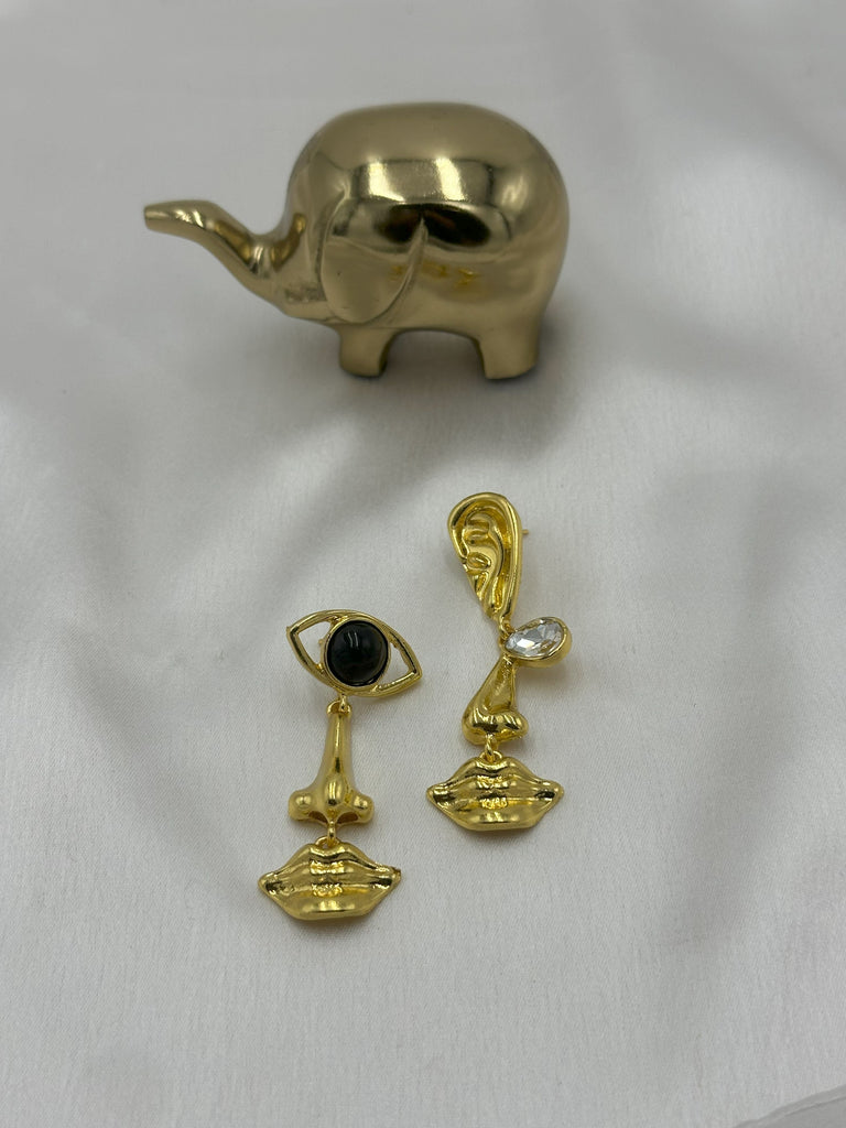 Uneven facecard earrings