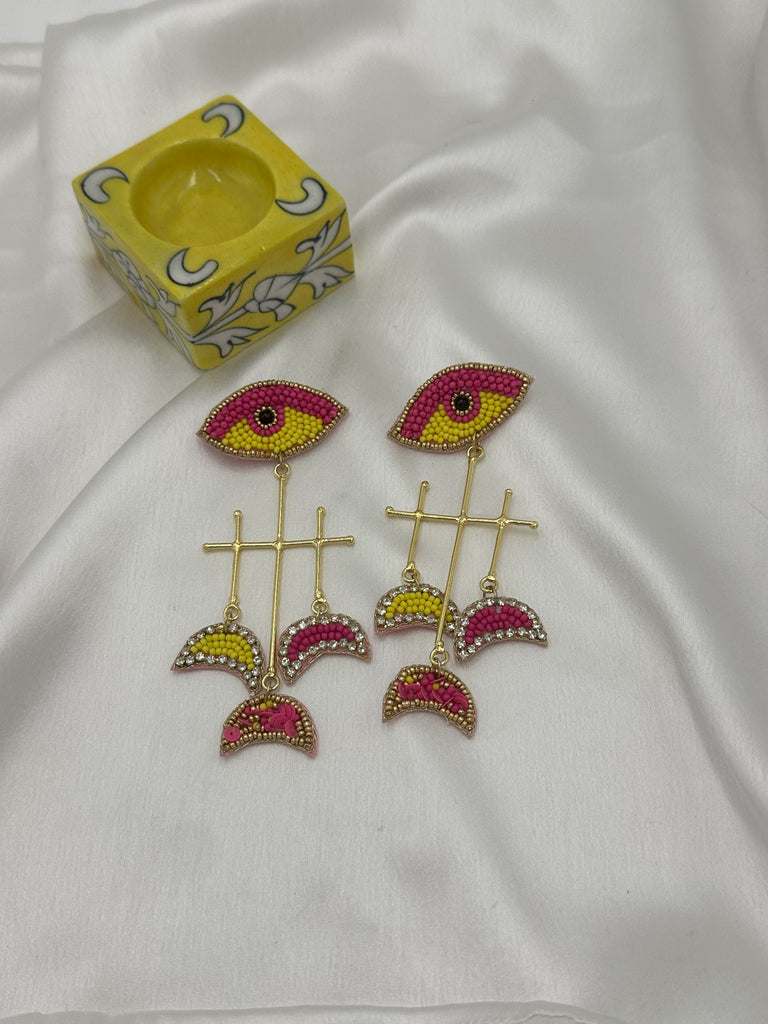 Beaded pinkish eye earrings