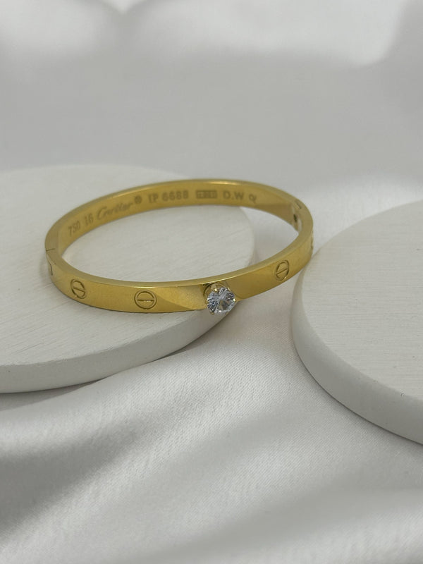 Diamond embedded cartier kada