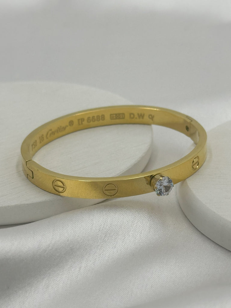 Diamond embedded cartier kada