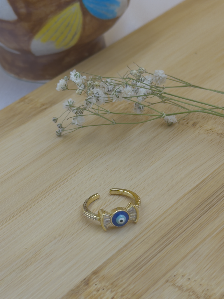 Bow shaped evil eye ring